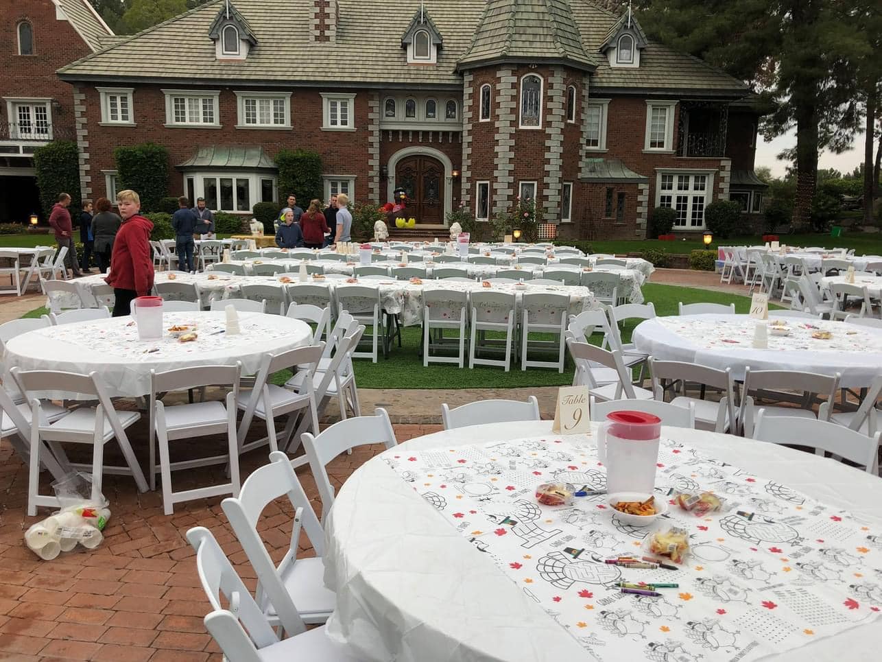 Dozens of tables set up on the lawn at The Lavender Farm at Chateau de Vie